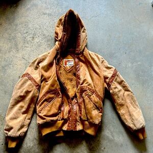 Vintage counter action leather insulated jacket. Very warm and fashionable.